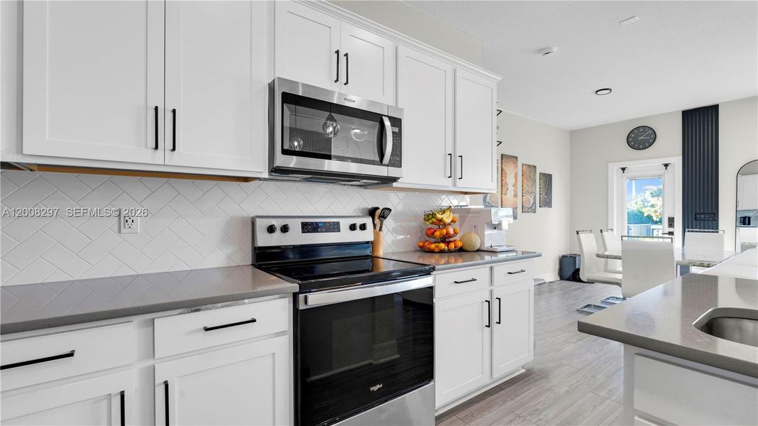 Furnished interior view inside a new home in , Lauderdale Lakes (Image 6).