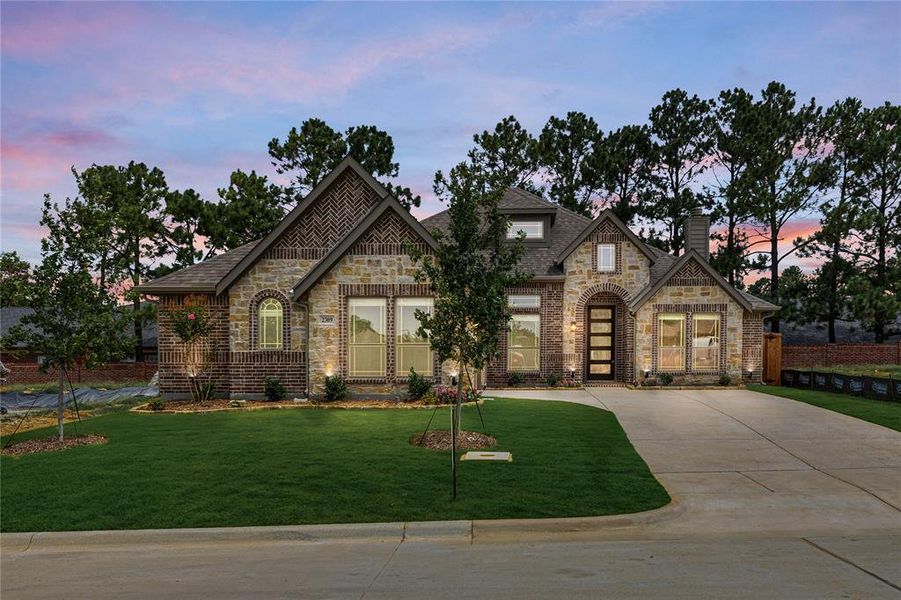 Front exterior of a new home in Grace Park, Bedford, TX, highlighting curb appeal (Image 2). Front exterior of a new home in Grace Park, Bedford, TX, highlighting curb appeal (Image 2).