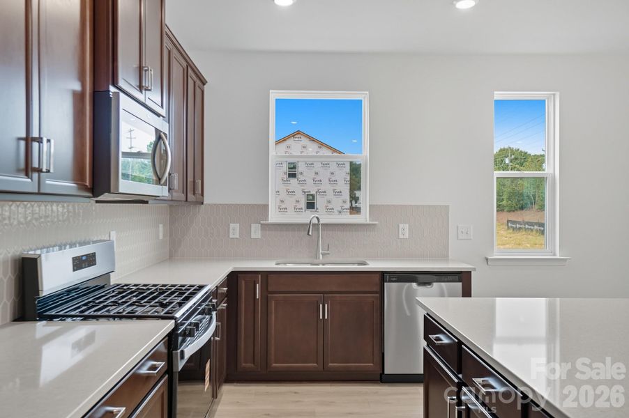 Furnished interior view inside a new home in Bellina, York (Image 8).