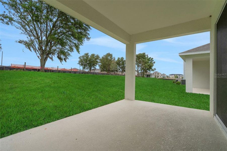 Exterior details and patio area of a home in Crossroads at Kelly Park, Apopka (Image 4). Exterior details and patio area of a home in Crossroads at Kelly Park, Apopka (Image 4).