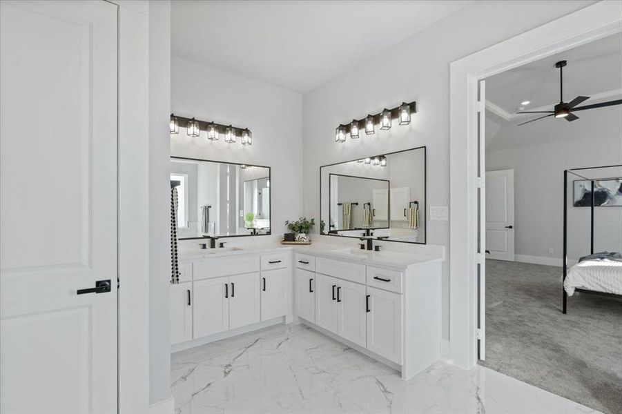 Bathroom with vanity and ceiling fan