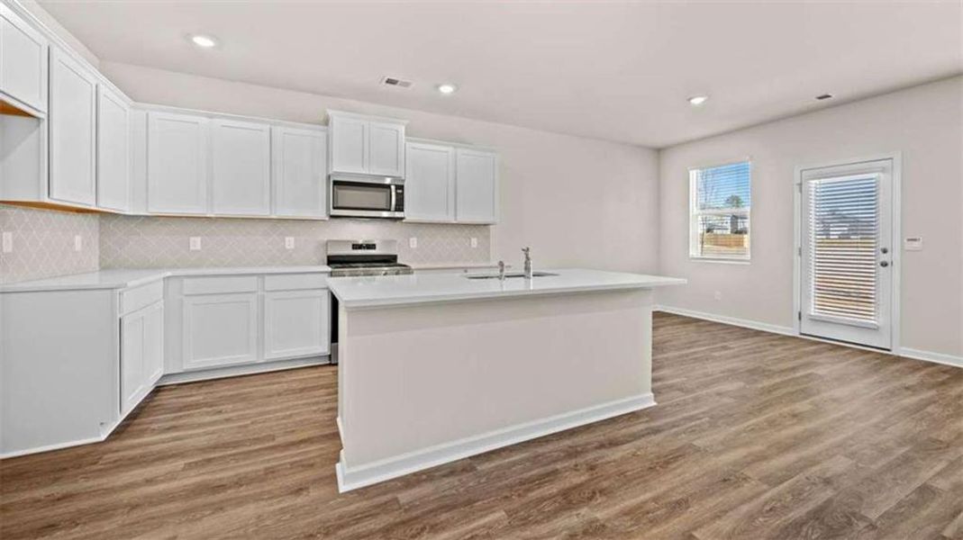 Furnished interior view inside a new home in Oakchase at Hampton, Hampton (Image 8). Furnished interior view inside a new home in Oakchase at Hampton, Hampton (Image 8).
