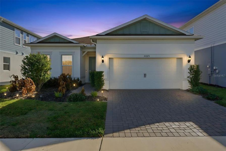 Front exterior of a new home in , Orlando, FL, highlighting curb appeal (Image 1). Front exterior of a new home in , Orlando, FL, highlighting curb appeal (Image 1).