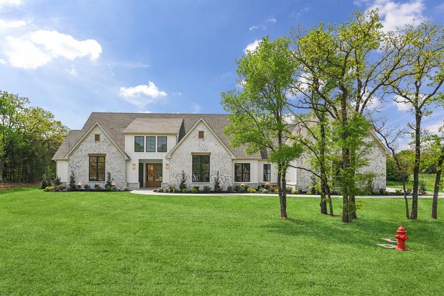 Front exterior of a new home in , Burleson, TX, highlighting curb appeal (Image 27).