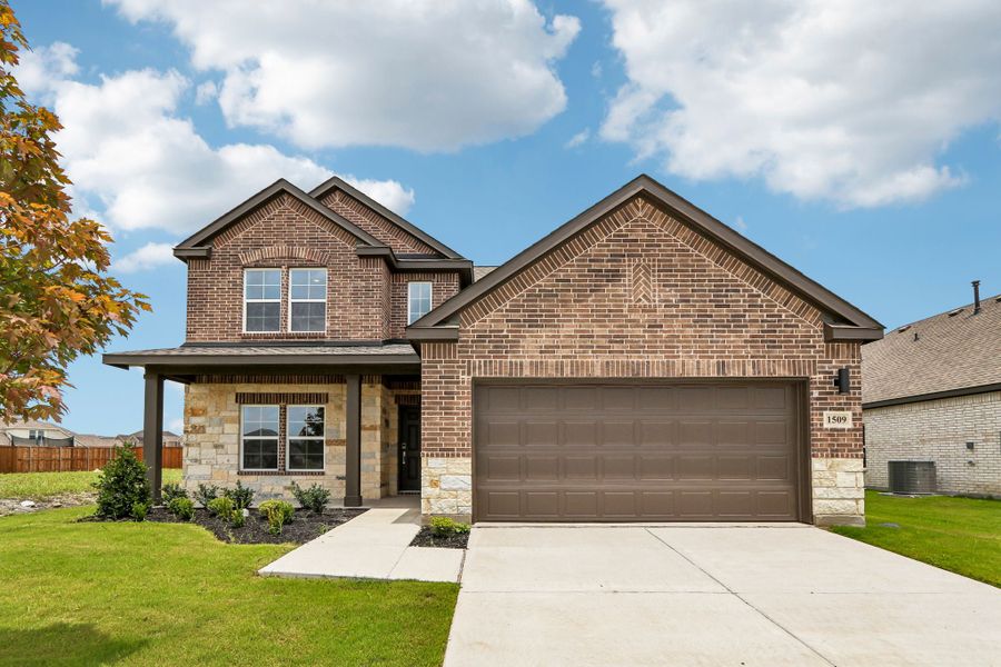 Front exterior of a new home in Anna Town Square, Anna, TX, highlighting curb appeal (Image 1). Front exterior of a new home in Anna Town Square, Anna, TX, highlighting curb appeal (Image 1).