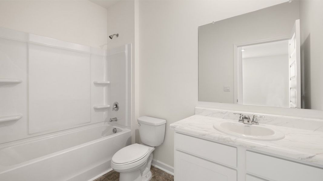 Representative unfurnished interior of a home built from the Mansfield by D.R. Horton in Brooks Station, Dacula (Image 38).