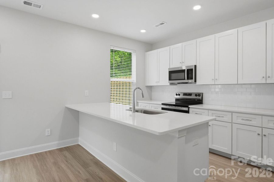 Furnished interior view inside a new home in , Mooresville (Image 6).