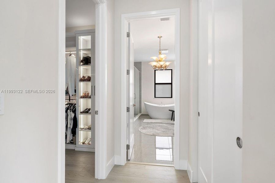 Primary Closet and Bath 1