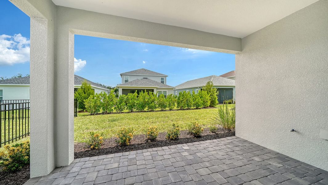 Exterior details and patio area of a home in Wildleaf at North River Ranch, Parrish (Image 2).