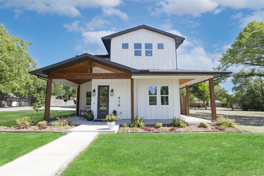 Front exterior of a new home in , Justin, TX, highlighting curb appeal (Image 23).