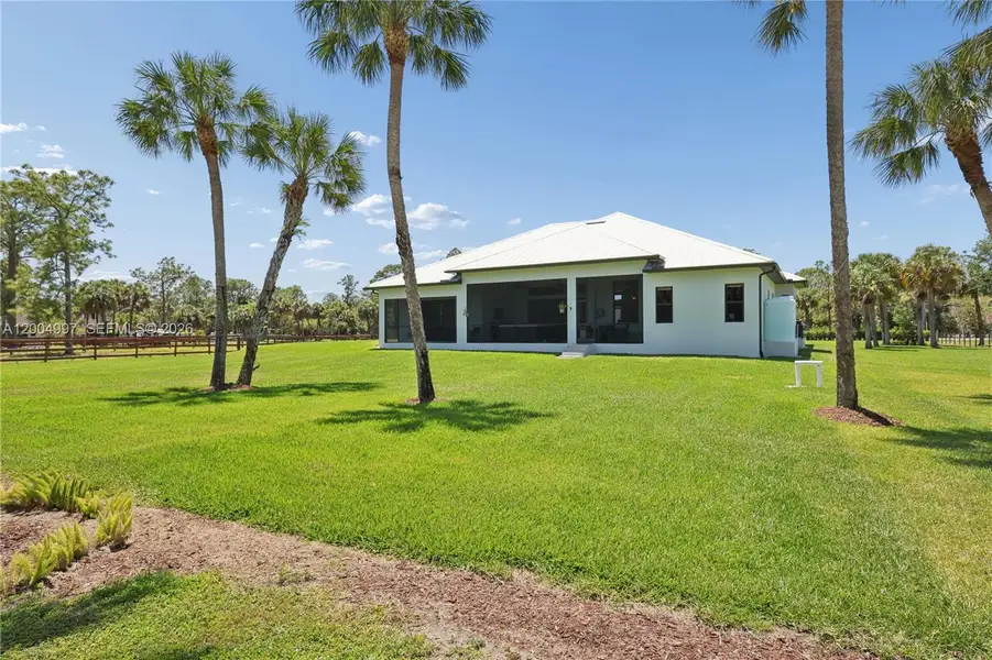 Exterior details and patio area of a home in , Naples (Image 3).