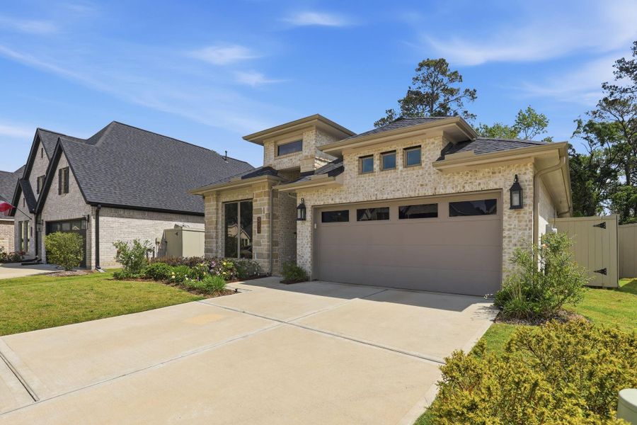 Landscaped lawn provides the perfect natural frame for the sleek, contemporary design.