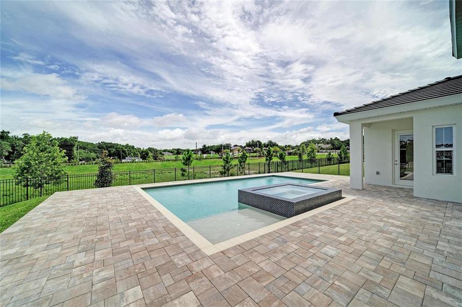 Exterior details and patio area of a home in Barrington Preserve, Parrish (Image 25).