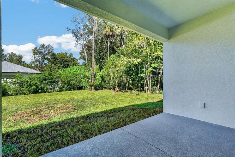 Exterior details and patio area of a home in , New Smyrna Beach (Image 4).
