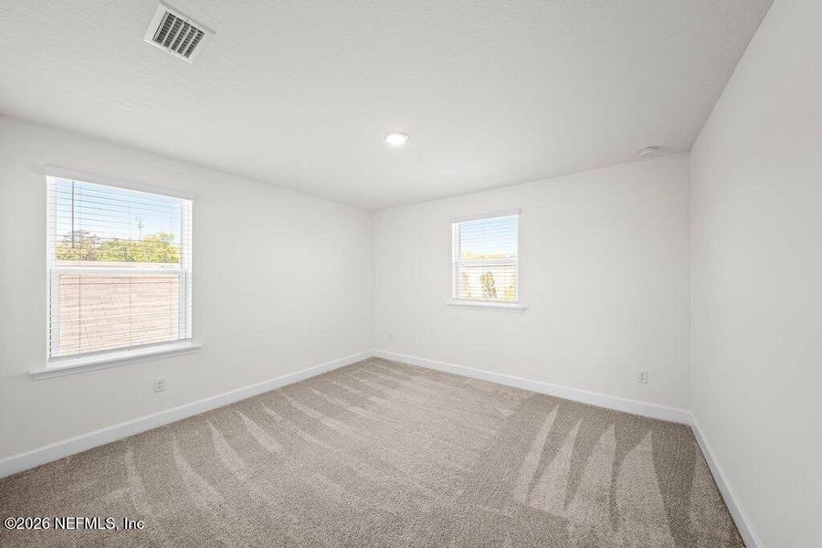 Spacious, unfurnished interior of a new home in Verano Creek, St. Augustine (Image 32).