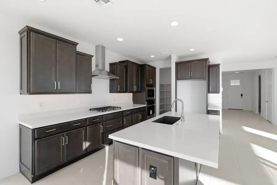 Representative furnished interior of a home built from the Triumph by Taylor Morrison in Artisan at Asante Encore Collection, Surprise (Image 5). Representative furnished interior of a home built from the Triumph by Taylor Morrison in Artisan at Asante Encore Collection, Surprise (Image 5).