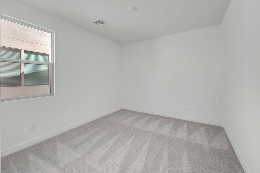 Spacious, unfurnished interior of a new home in Soleo, San Tan Valley (Image 30).