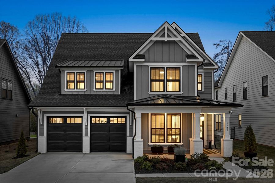 Front exterior of a new home in Matthews Ridge Reserve, Matthews, NC, highlighting curb appeal (Image 21). Front exterior of a new home in Matthews Ridge Reserve, Matthews, NC, highlighting curb appeal (Image 21).