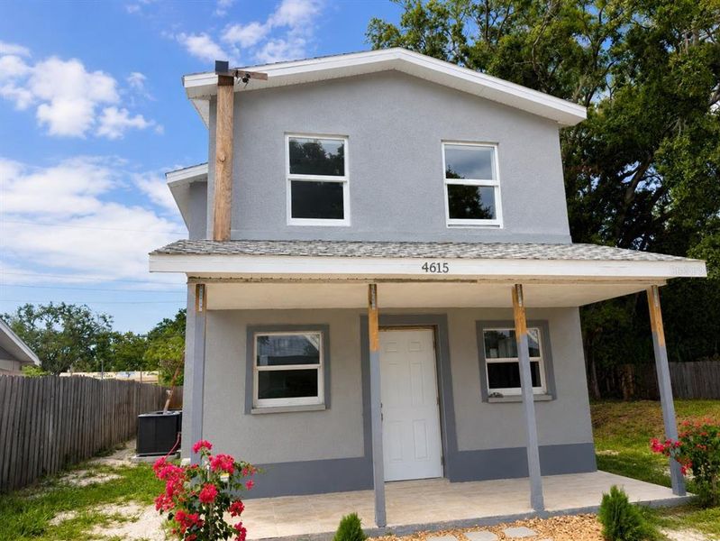 Front exterior of a new home in , Holiday, FL, highlighting curb appeal (Image 21).