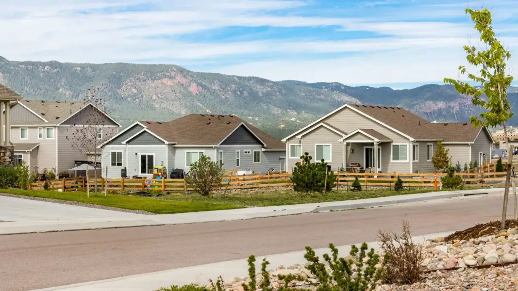 Front exterior of a new home in Jackson Creek, Monument, CO, highlighting curb appeal (Image 4). Front exterior of a new home in Jackson Creek, Monument, CO, highlighting curb appeal (Image 4).