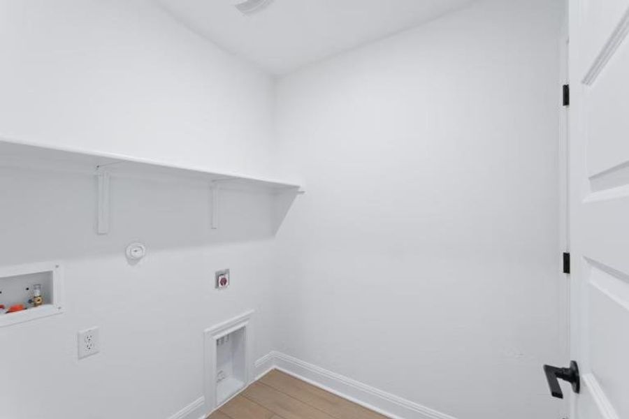 Photo of Pulte model home with same floor plan, not of actual home listed.