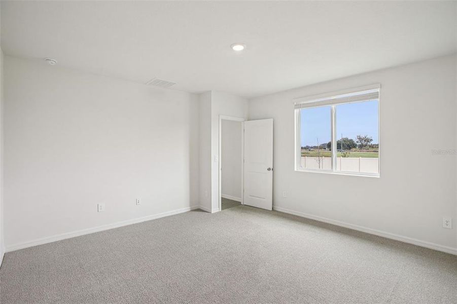 Spacious, unfurnished interior of a new home in Two Rivers - Classic Series, Zephyrhills (Image 16).