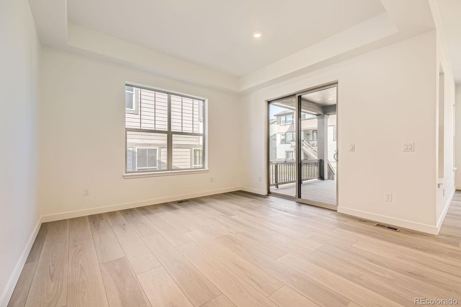 Spacious, unfurnished interior of a new home in Red Rocks Ranch: The Grand Collection, Morrison (Image 7).