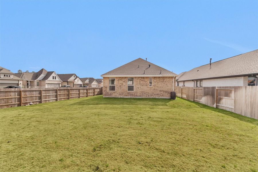 Exterior details and patio area of a home in Artavia: Avante Collection, Conroe (Image 21).