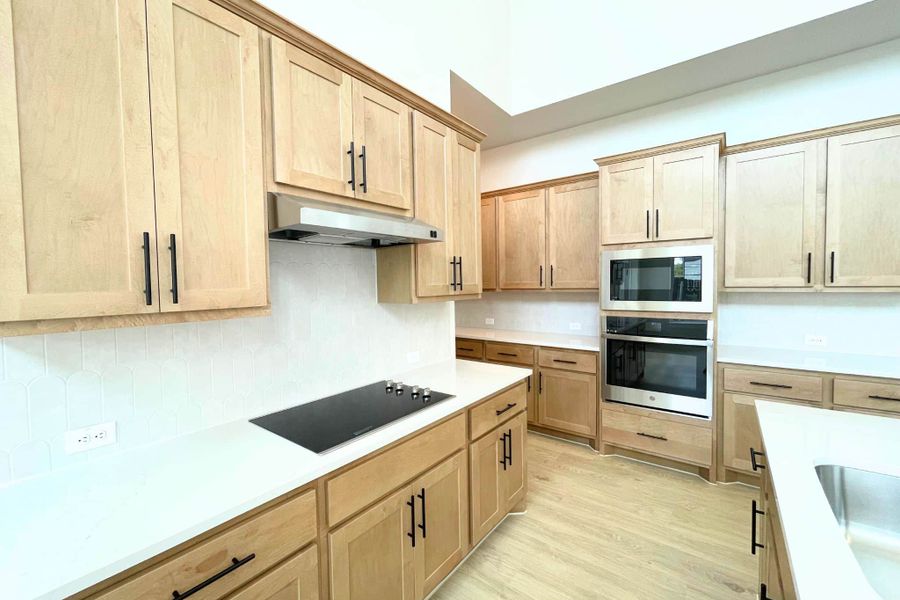 Furnished interior view inside a new home in Whisper Valley, Manor (Image 9).