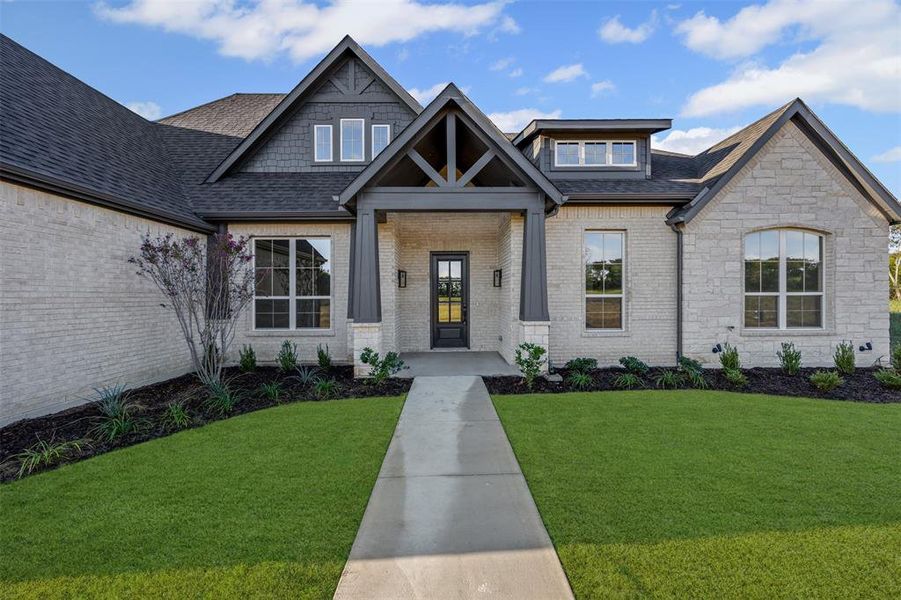 Exterior details and patio area of a home in Waterfall Ranch - 1 Acre Lots, Waxahachie (Image 3). Exterior details and patio area of a home in Waterfall Ranch - 1 Acre Lots, Waxahachie (Image 3).