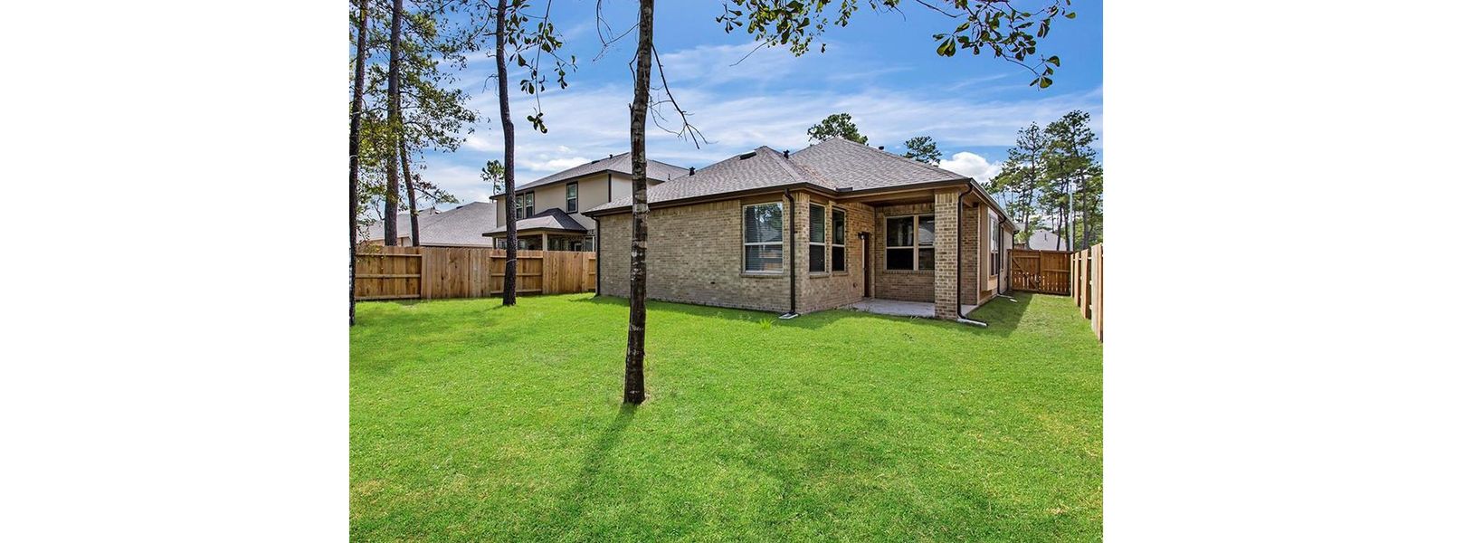 Exterior details and patio area of a home in Wood Leaf Reserve, Tomball (Image 3).