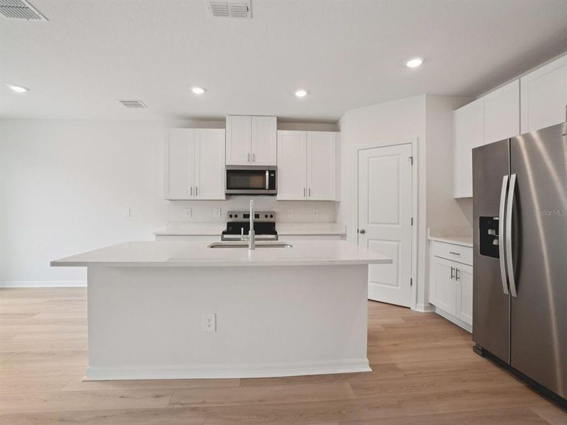 Furnished interior view inside a new home in Benton Hills - Premier Series, Brooksville (Image 6).