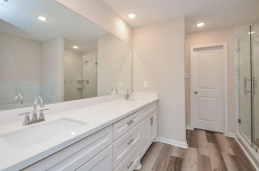 Dual vanity + walk-in shower = smoother mornings. Designed for efficiency and ease. Dual vanity + walk-in shower = smoother mornings. Designed for efficiency and ease.