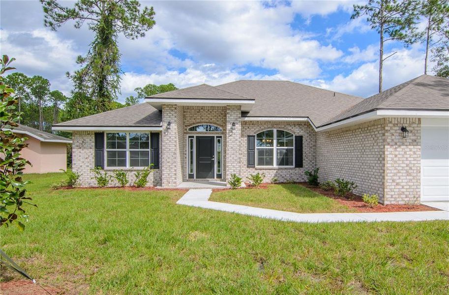 Exterior details and patio area of a home in , Palm Coast (Image 26).