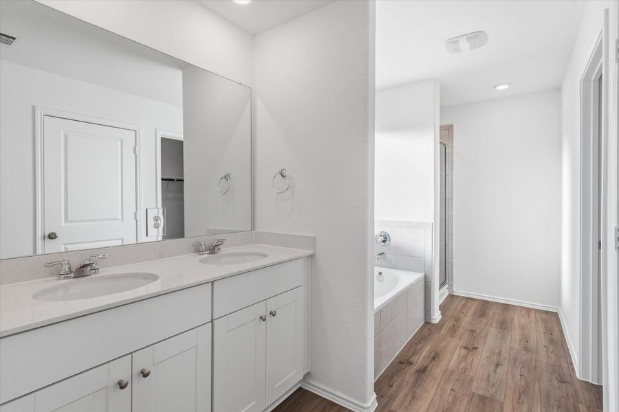 Furnished interior view inside a new home in Thunder Rock: Watermill Collection, Marble Falls (Image 10).