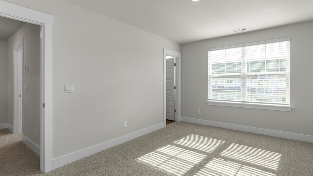 Spacious, unfurnished interior of a new home in The Palms at Indigo Preserve Townhomes, Leland (Image 26). Spacious, unfurnished interior of a new home in The Palms at Indigo Preserve Townhomes, Leland (Image 26).
