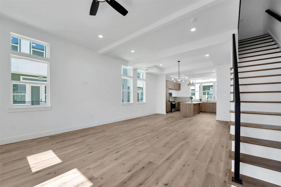 Another view of this large and open living space and kitchen.