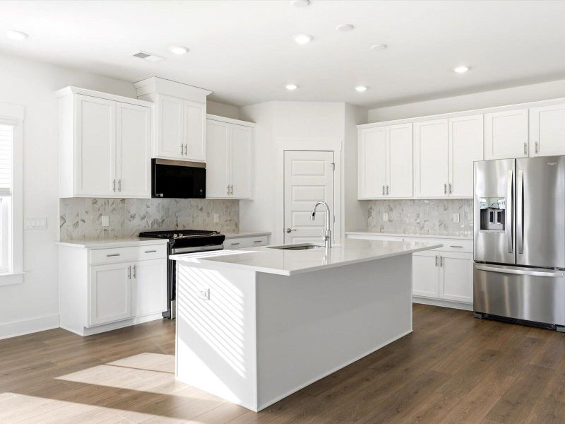 Furnished interior view inside a new home in The Coves at Lakes of Cane Bay, Summerville (Image 6).