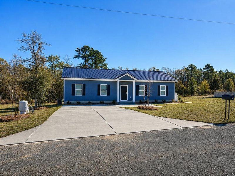 Front exterior of a new home in , Walterboro, SC, highlighting curb appeal (Image 1). Front exterior of a new home in , Walterboro, SC, highlighting curb appeal (Image 1).