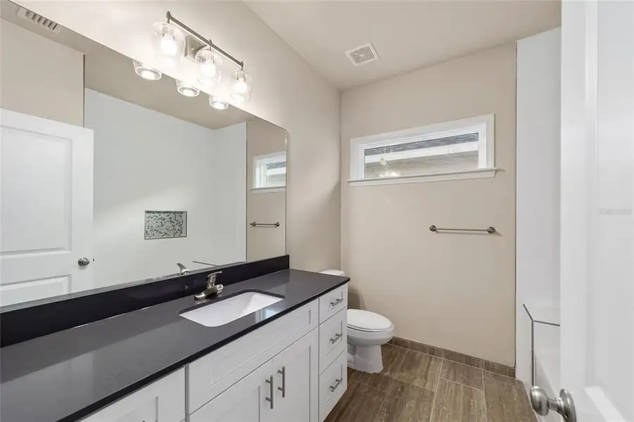 Furnished interior view inside a new home in , Gainesville (Image 6).