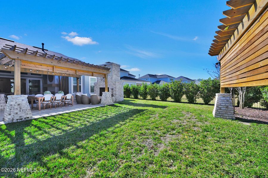 Exterior details and patio area of a home in Palmetto Cove, Ponte Vedra (Image 19).