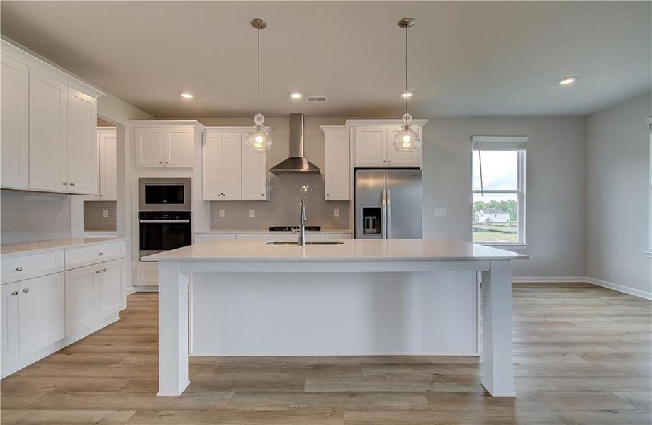 Furnished interior view inside a new home in Westwind Estates, Hampton (Image 4).
