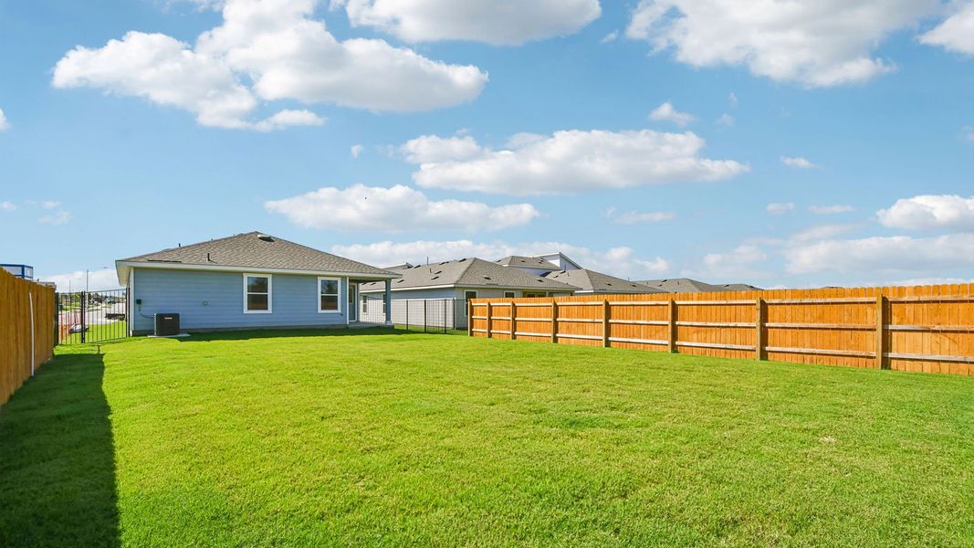 Exterior details and patio area of a home in Trails at Wildhorse, Austin (Image 23).