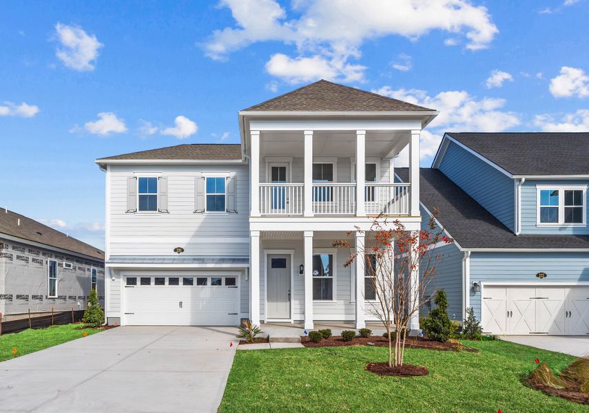 Front exterior of a new home in Beach View at Grande Dunes, Myrtle Beach, SC, highlighting curb appeal (Image 1).