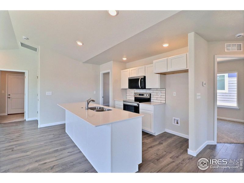 Furnished interior view inside a new home in , Evans (Image 6). Furnished interior view inside a new home in , Evans (Image 6).
