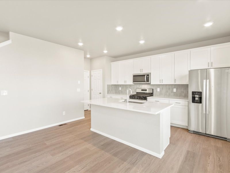 The Bergamot floorplan interior image taken at a Meritage Homes community in Brighton, CO.