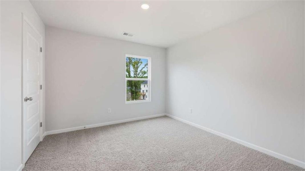 Spacious, unfurnished interior of a new home in Brooks Station, Dacula (Image 28).
