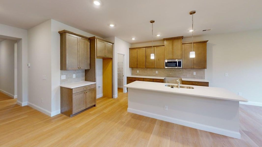 Representative furnished interior of a home built from the Melton Basement by Brookline Homes in The Terraces at Cramerton Mills, Gastonia (Image 3).
