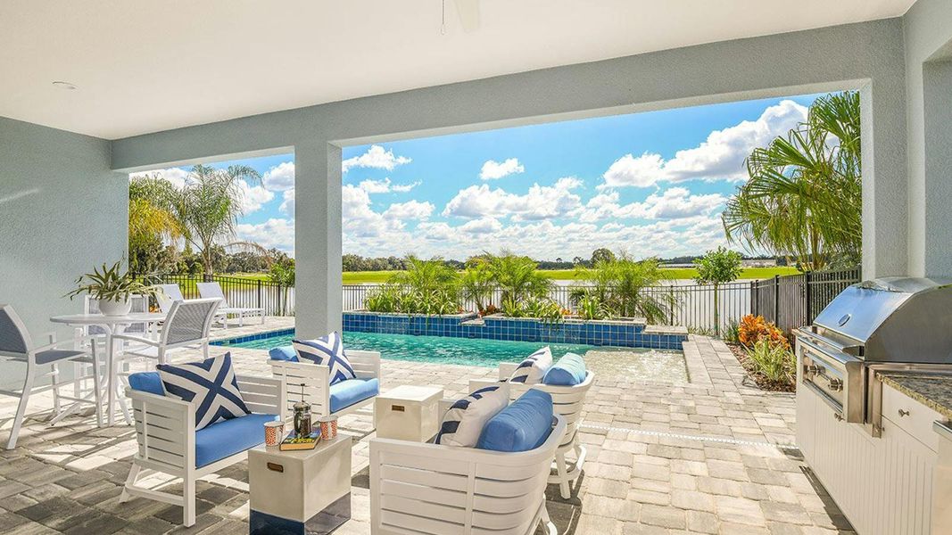 Exterior details and patio area of a home in Canoe Creek Real Estate and Homes for Sale in Parrish, FL - Neal Communities, Parrish (Image 25).