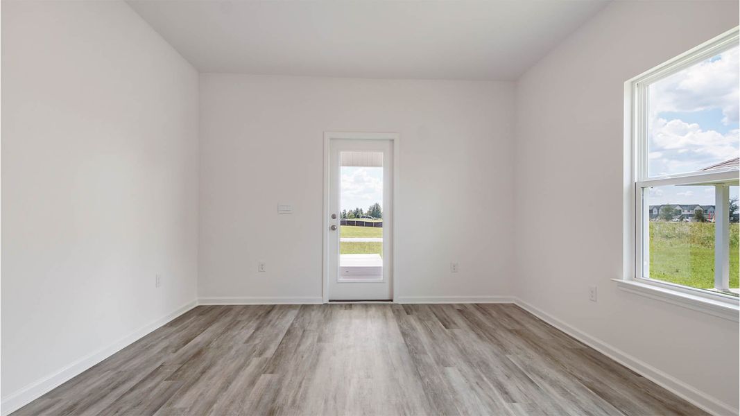 Representative unfurnished interior of a home built from the Aspen by D.R. Horton in Owl's Head East, Freeport (Image 24).